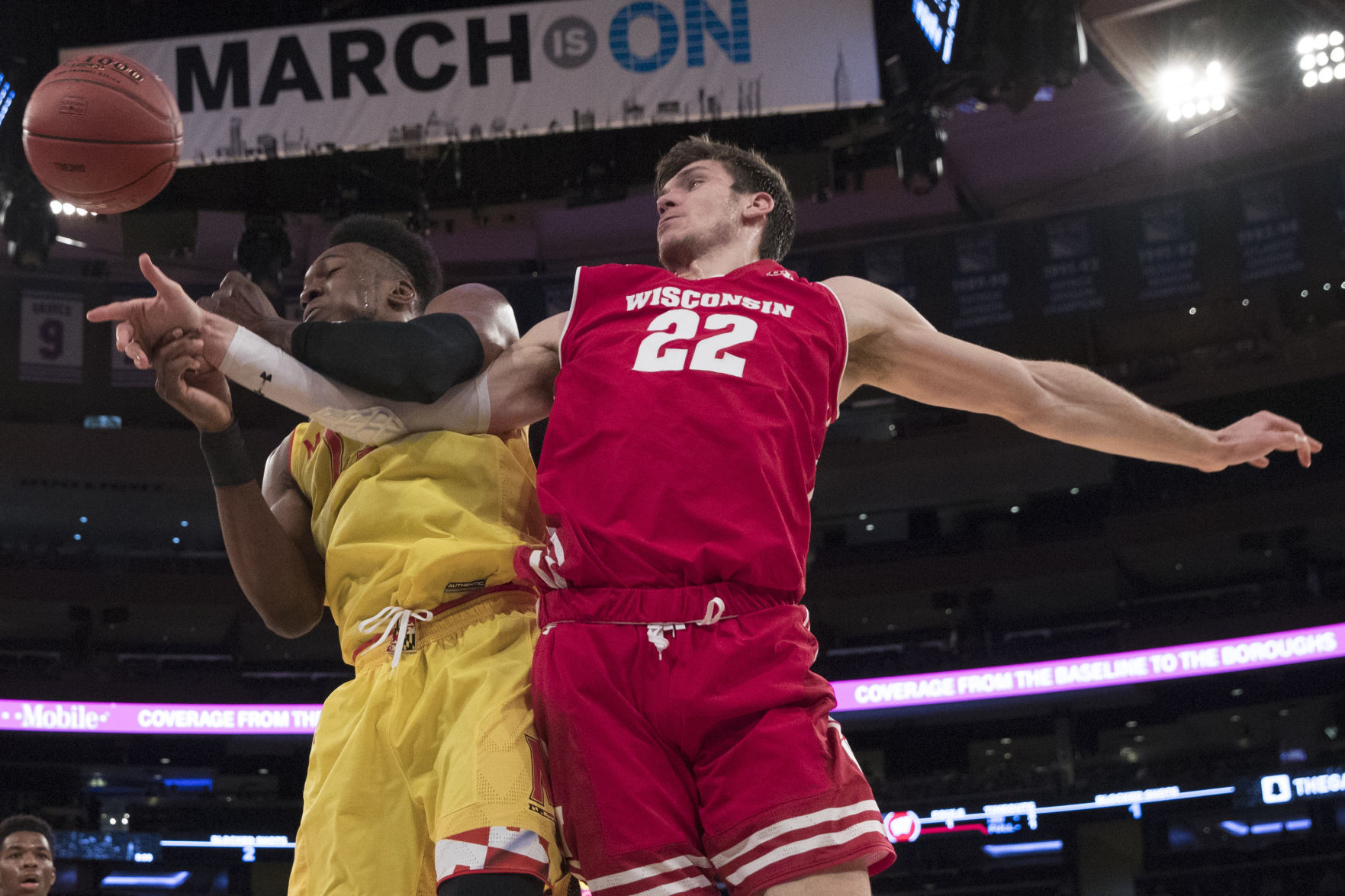 Ethan Happ fights for rebound, AP photo